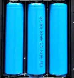 Three blue 18650 rechargeable batteries arranged vertically inside a black holder for smart video doorbell power supply