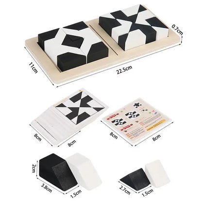 White and black wooden tangram puzzle game pieces with measurement dimensions and instruction cards on a wooden tray