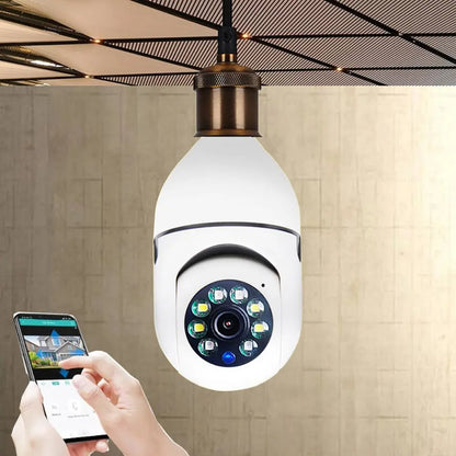 Close-up of white WiFi 1080P bulb camera with 4x zoom and 5G connectivity, shown with mobile phone app monitoring live feed